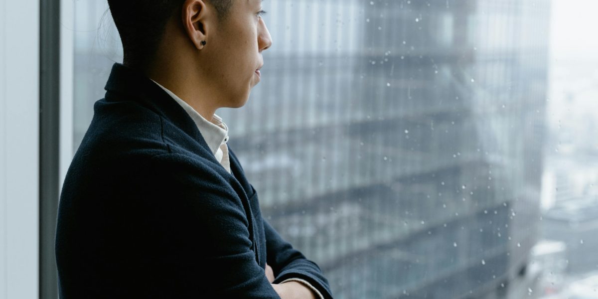 A person reflecting on their future career path, inspired by Dubai's opportunities.