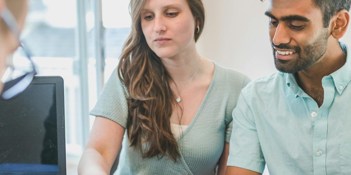 A person receiving expert advice from a financial or legal professional.