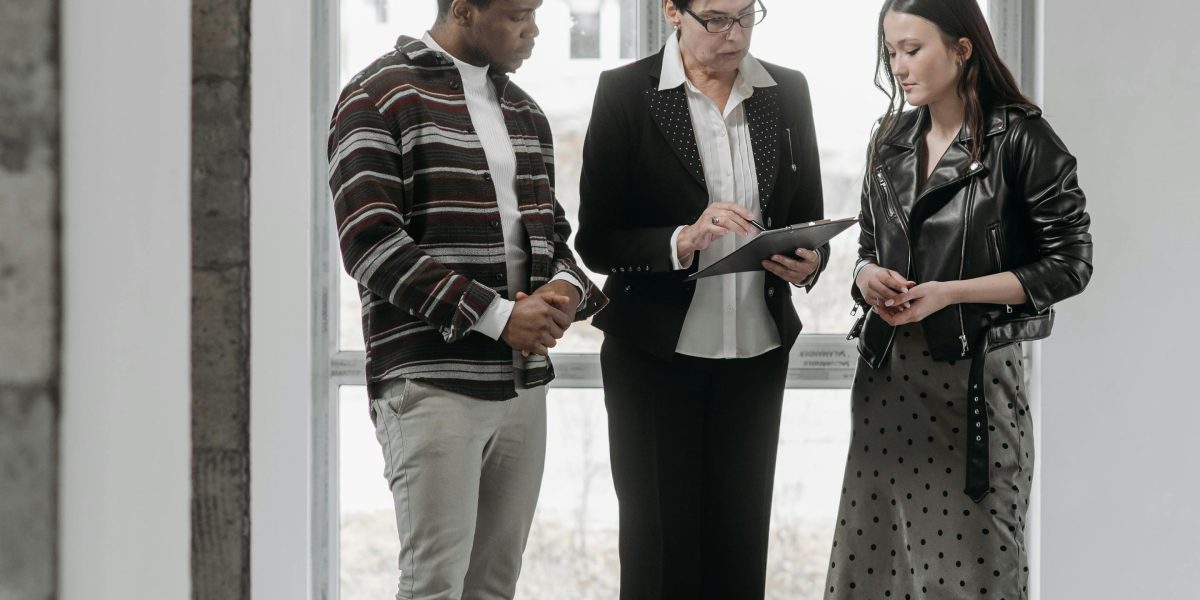 A client in a discussion with a real estate agent, highlighting the importance of professional guidance.