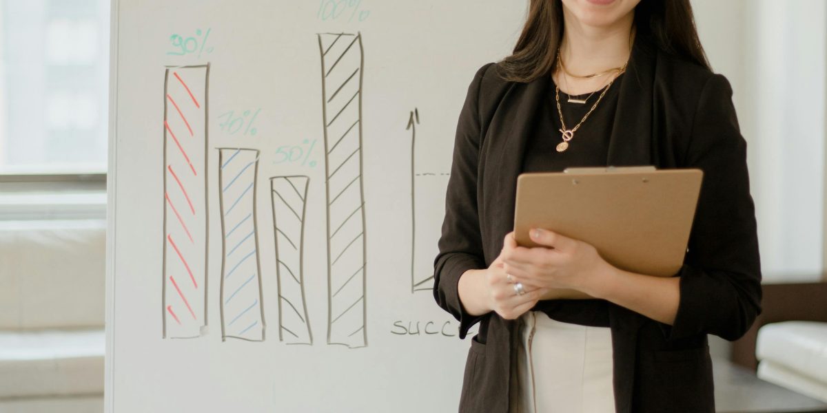A person actively outlining their career objectives, reflecting the pursuit of growth in Dubai's real estate market.