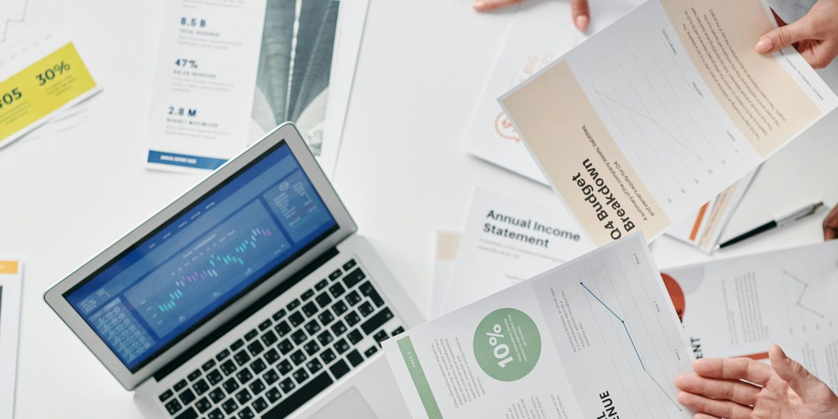 A group of professionals discussing market trends and investment strategies, reflecting the importance of informed decisions in Dubai's real estate sector.